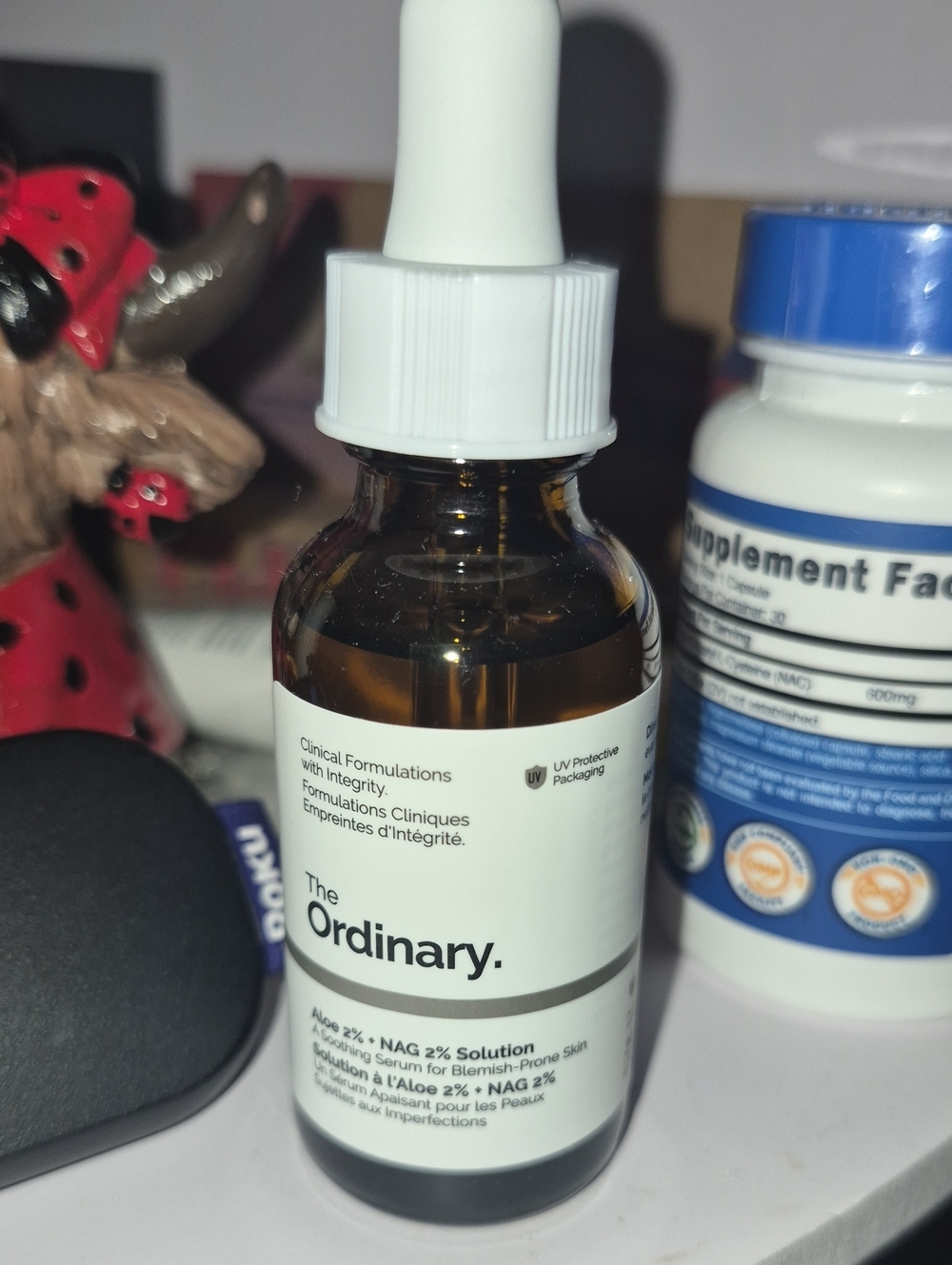 The Ordinary White and Amber Dropper Serum Bottle